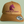 Caramel trucker cap on sage background